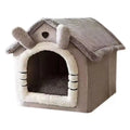 Cama estilo casa para cães.