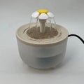 Fonte de água elétrica filtrante para gatos.